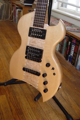 front view of the body of a custom commisioned sitka spruce electric guitar made by michael mccarten